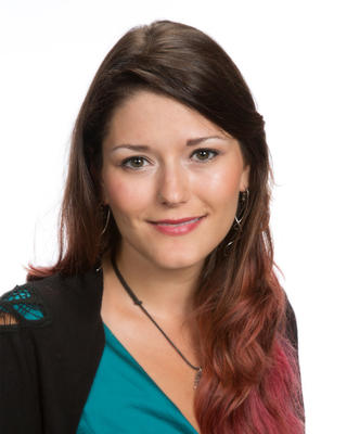 a person smiling at the camera