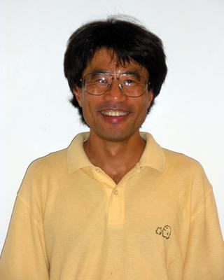a person smiling at the camera