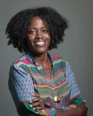 a person smiling at the camera