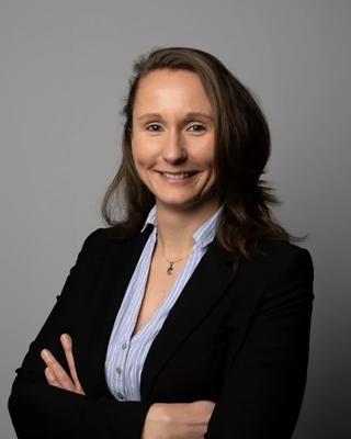 a person smiling at the camera