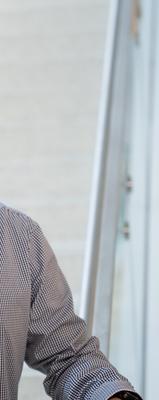 a person in front of a white staircase