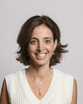 a person smiling at the camera