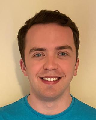 a person smiling at the camera