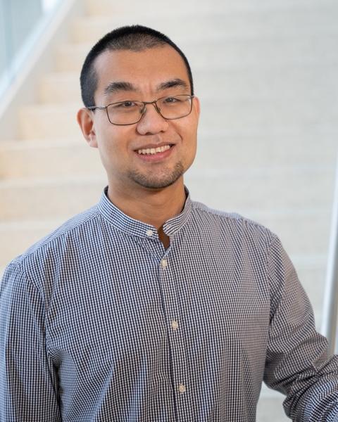 a person in front of a white staircase
