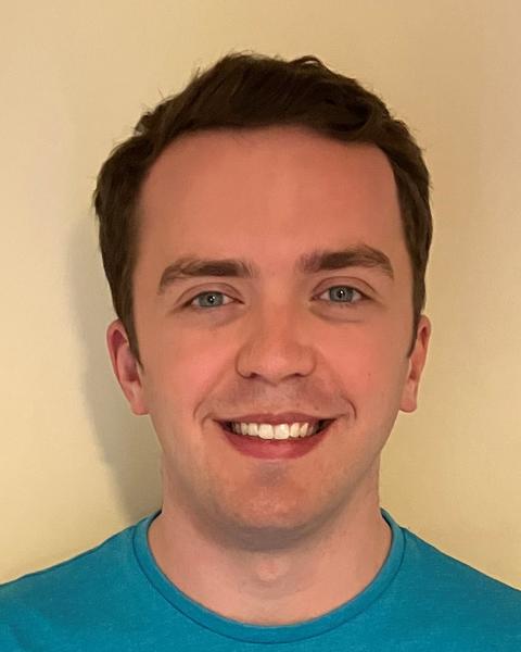 a person smiling at the camera